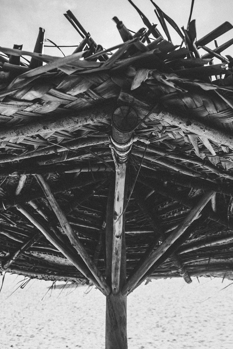 paradise beach grayscale photo of nipa hut pudukuppam